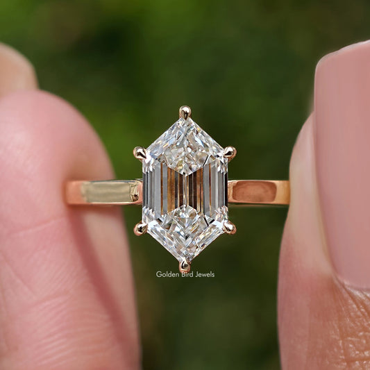 Step-cut marquise diamond ring, close-up of step-cut center stone and prongs