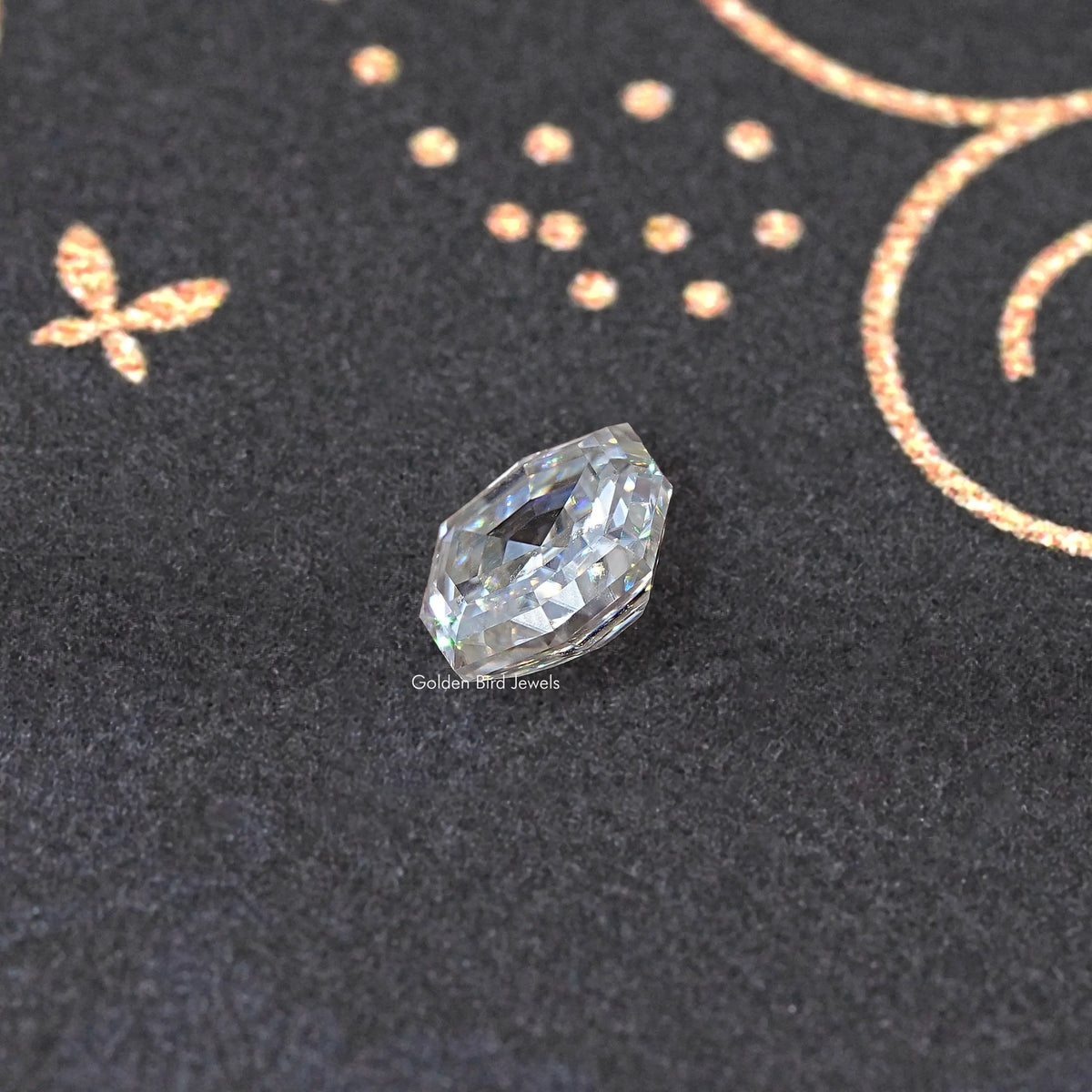 Colorless cushion-cut moissanite loose gemstone, angled view showing step facets.