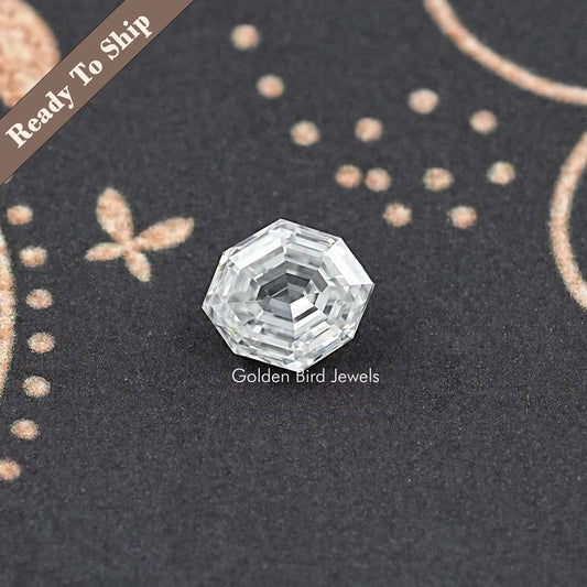 Faceted moissanite loose stone, step-cut clear gem, centered