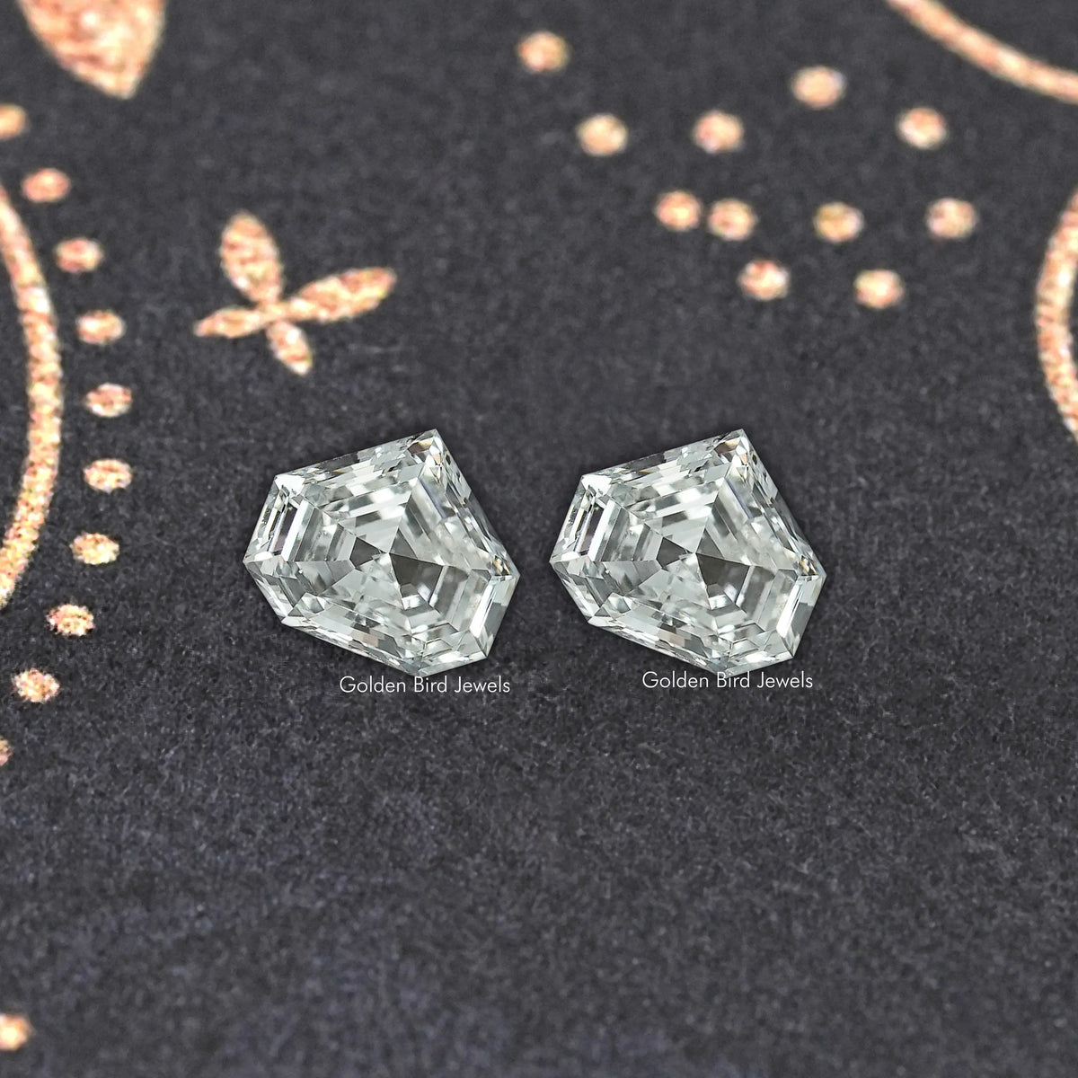 Pair of step-cut lab-grown diamonds in clear tone, faceted and reflective