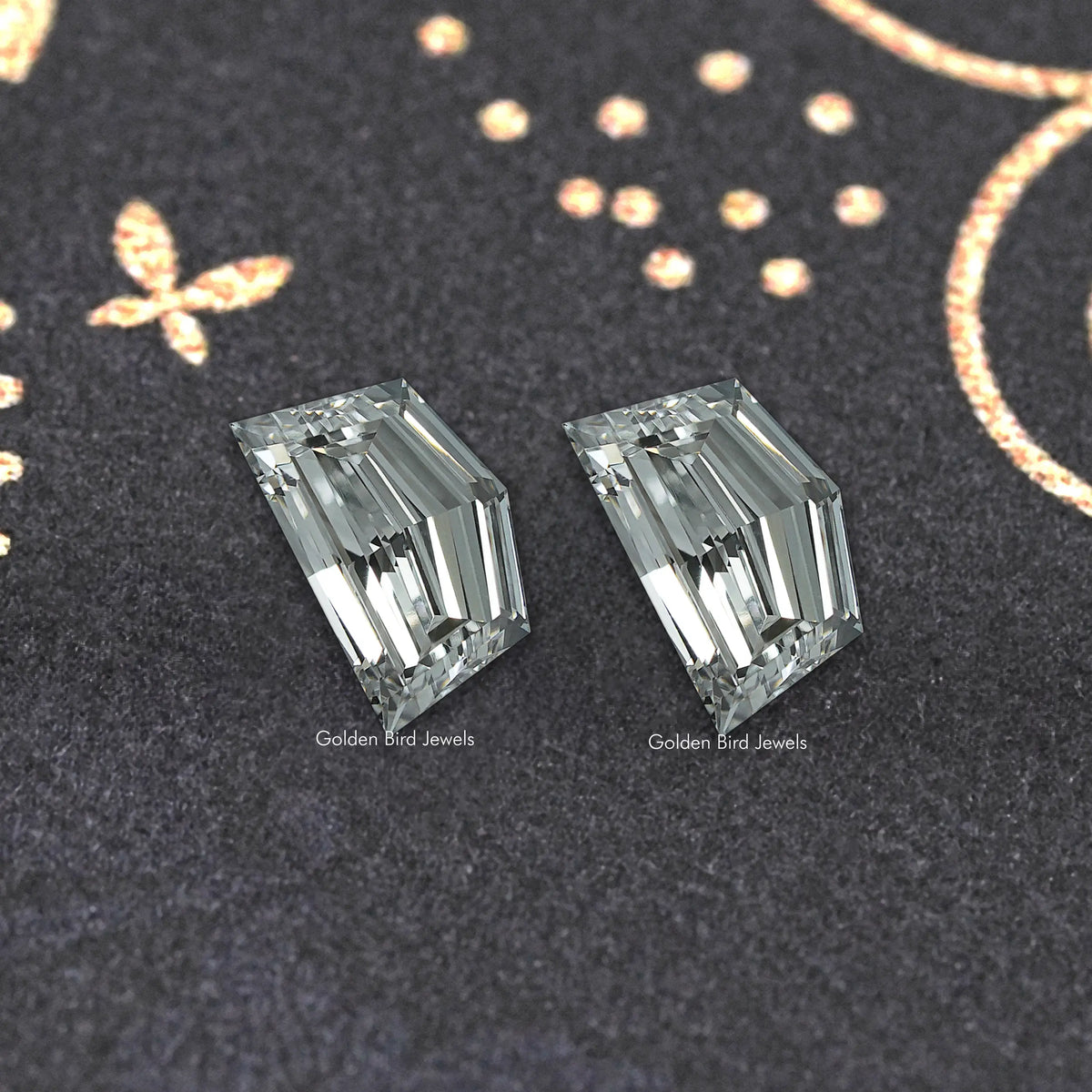 Pair of rectangular emerald-cut lab-grown diamonds with step facets, clear