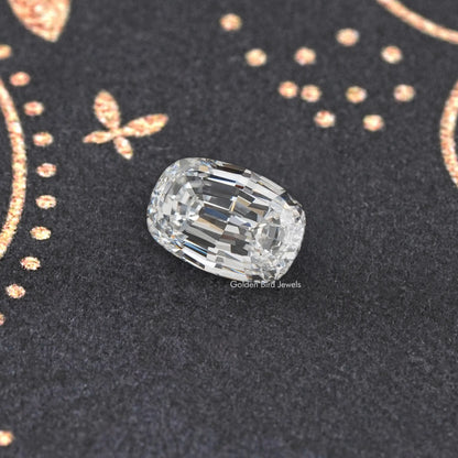 Loose oval cushion step-cut lab diamond with bright facet reflections