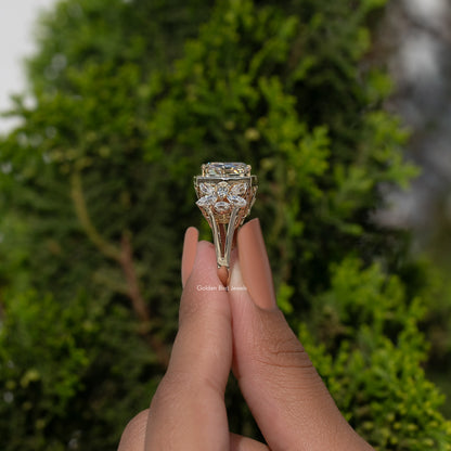 Cushion-cut moissanite ring top view, gold-tone halo and prong setting