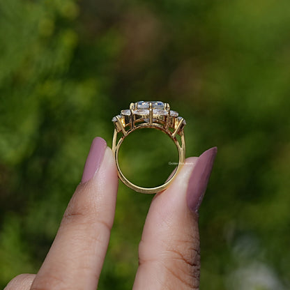 Gold-tone moissanite ring band underside view with prong set halo and center stone