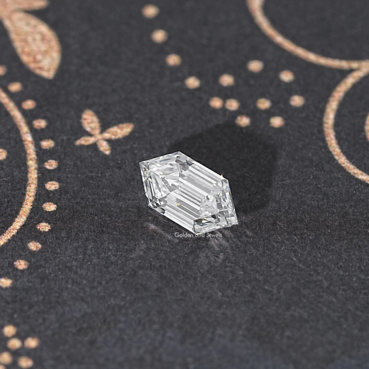 Rectangular step-cut lab diamond, clear white with high-contrast facet reflections.