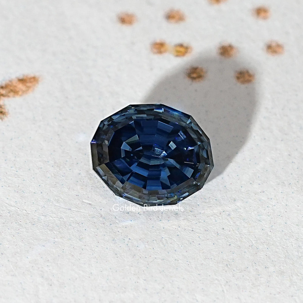 Loose step-cut oval blue moissanite gemstone in close-up view