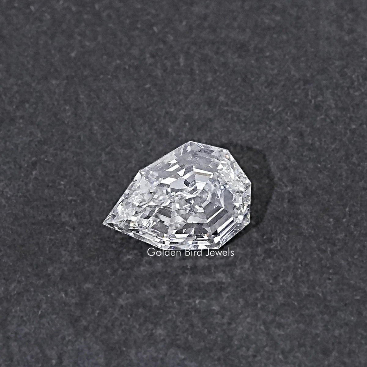 Lab-grown pear-cut diamond, step-cut faceted table and crown, loose stone