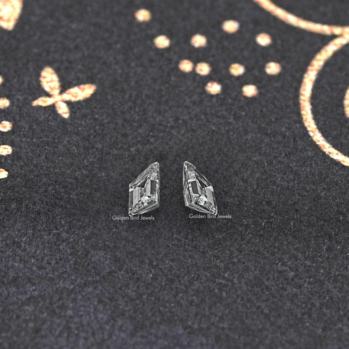 Trapezoid step-cut lab diamond stud earrings pair with prong-set square stones