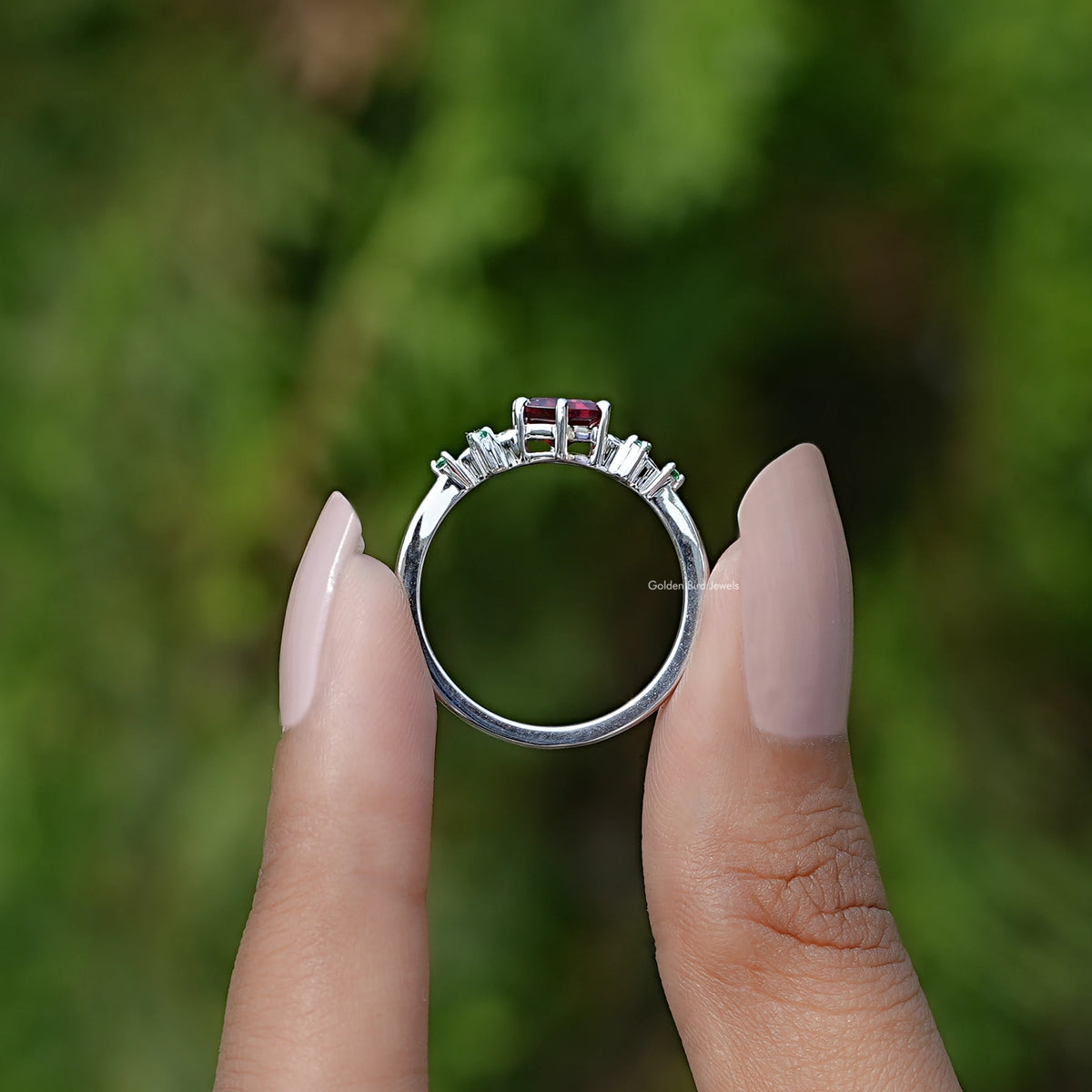 Back View of Hexagon Cut Gemstone Accent Ring In two fingers