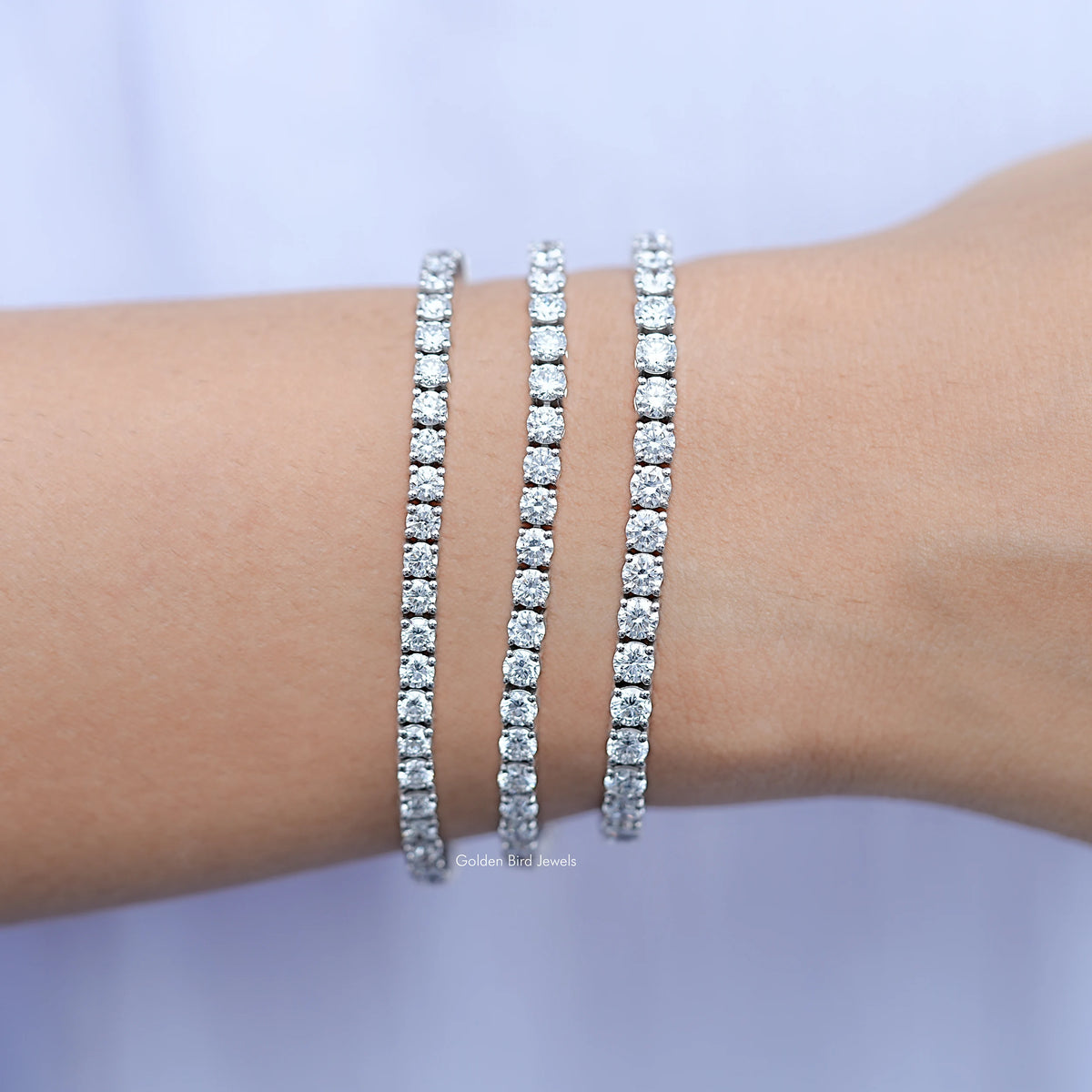 Round-cut lab diamond tennis bracelet in silver, diamond rows stacked on wrist
