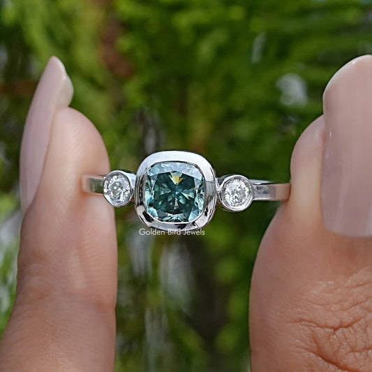 Three-stone cushion-cut moissanite ring with round side stones, silver band