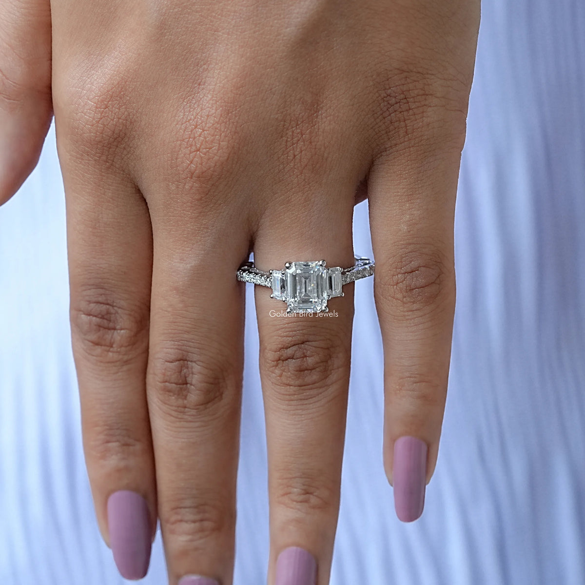 View of Emerald Cut Moissanite Engagement Ring In Finger