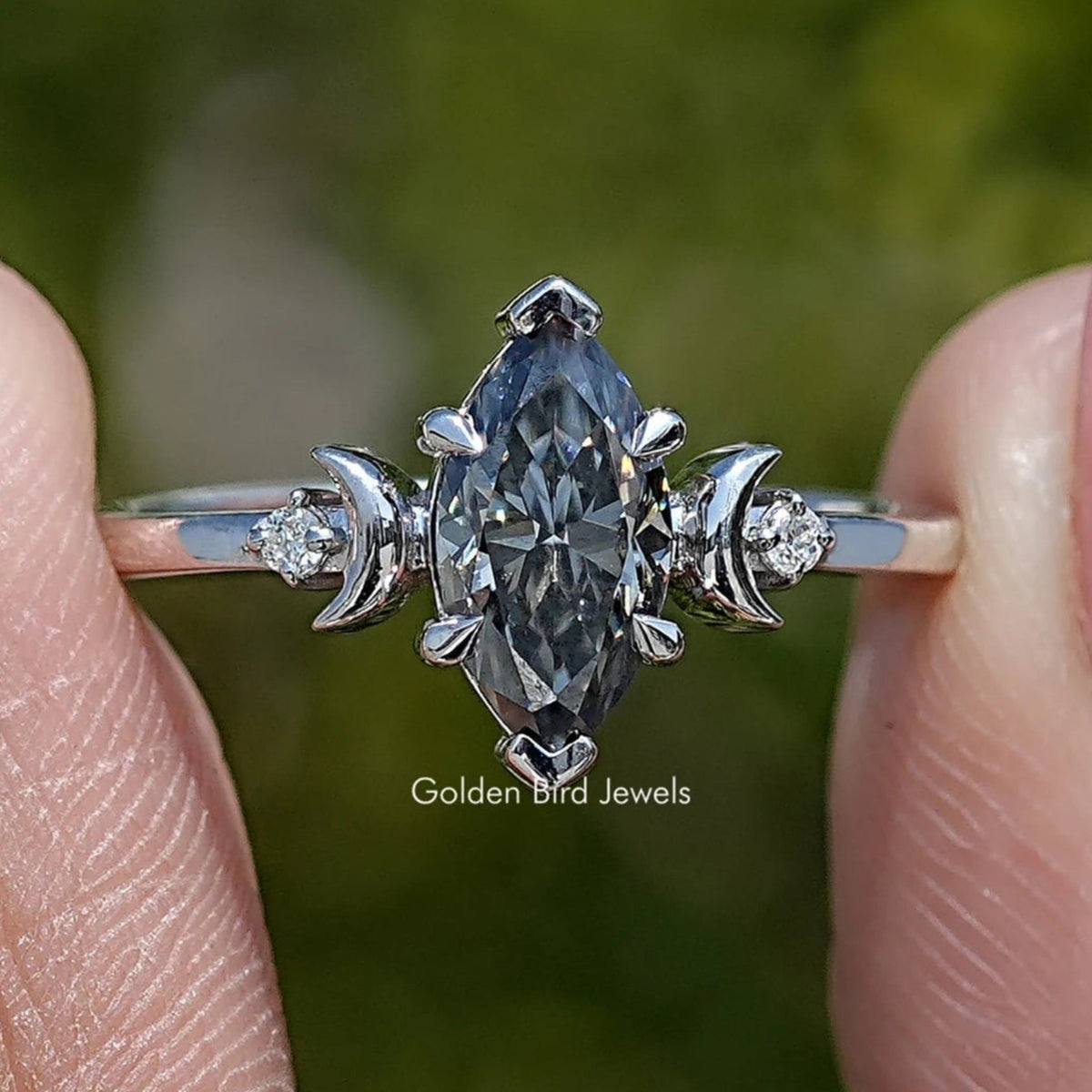 Front View of Three Stone Marquise Cut Moissanite Ring