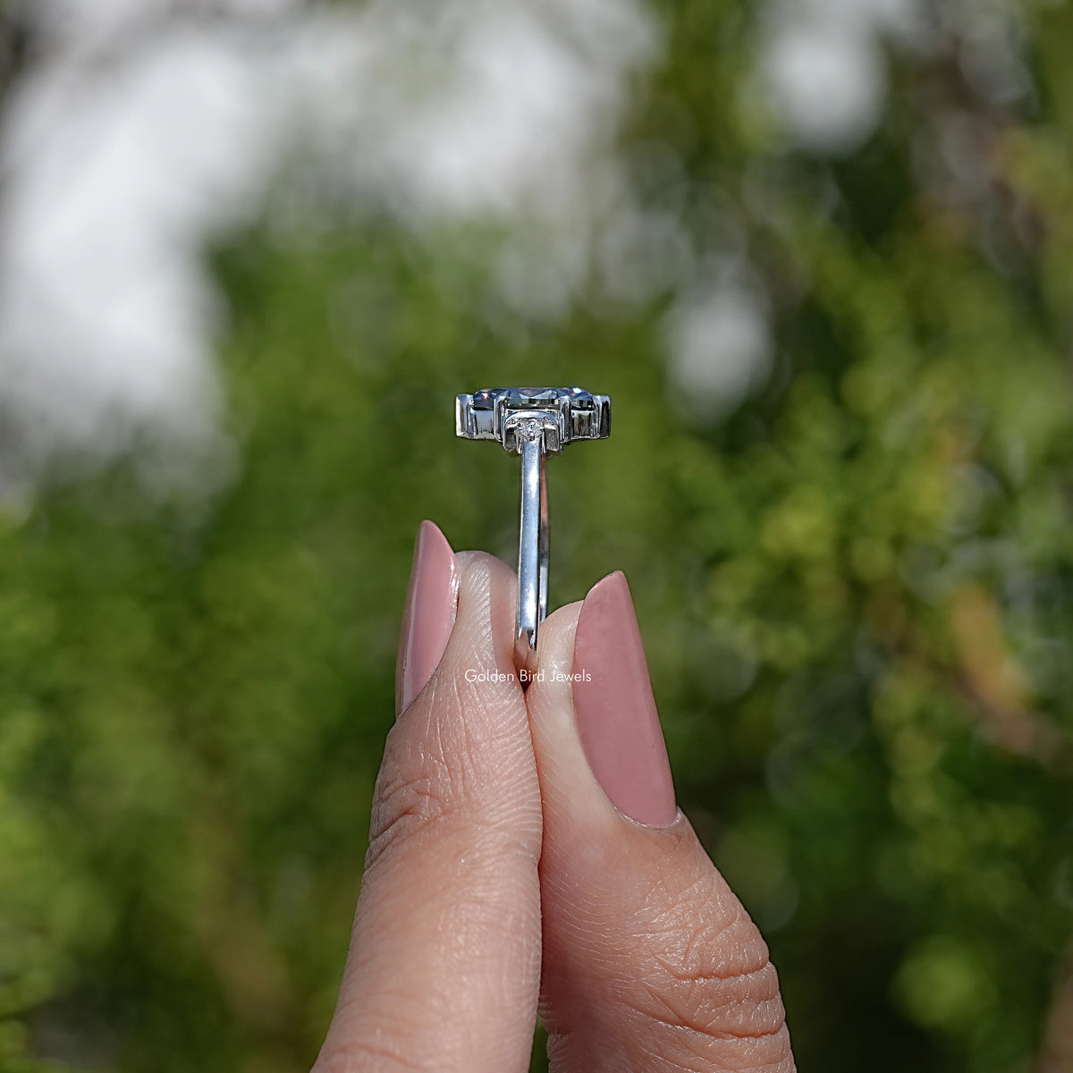 Side View Of Three Stone Marquise Moissanite Ring