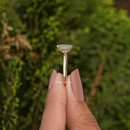 Side View of Emerald And Pear Lab Diamond Toi Et Moi Ring In two fingers
