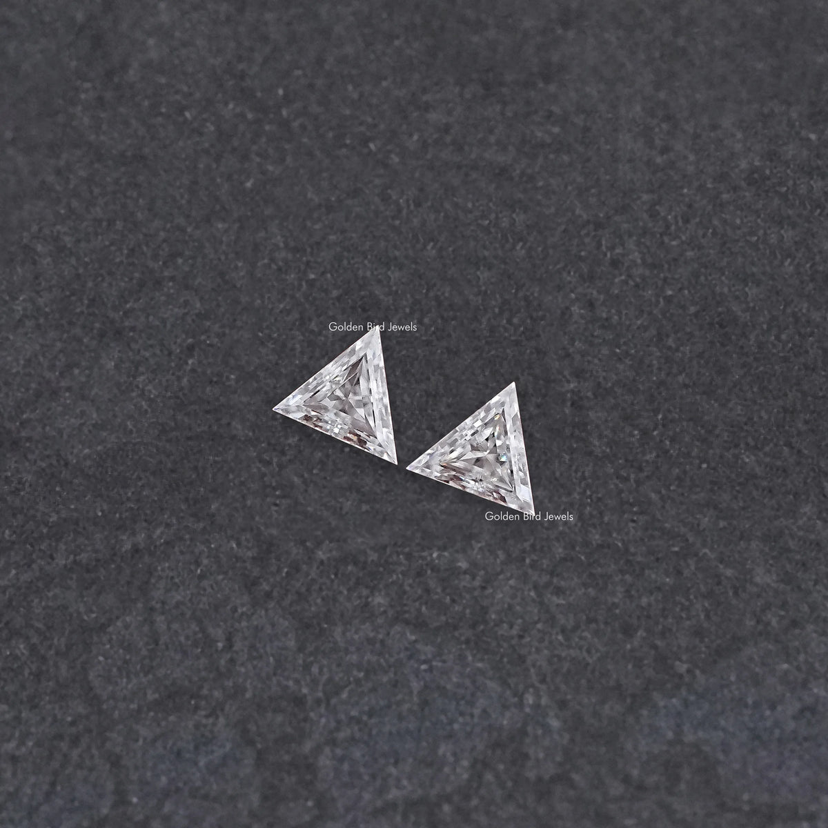 Matching triangular moissanite stones, clear and faceted