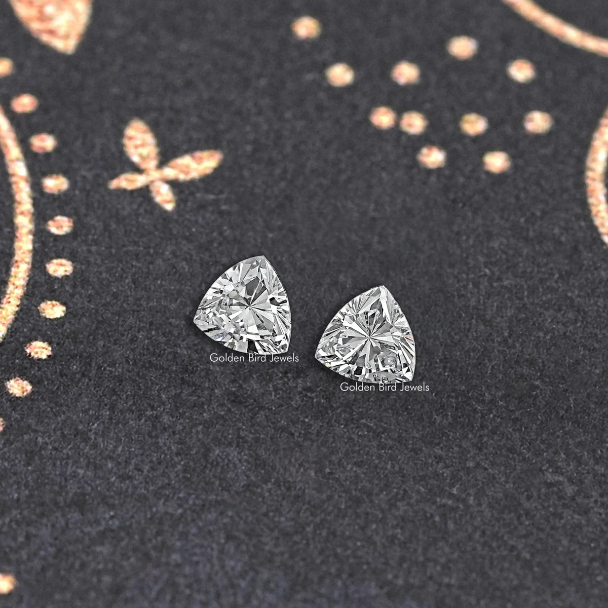 Loose trillion-cut lab-grown diamond pair, two clear triangular stones with faceted sparkle