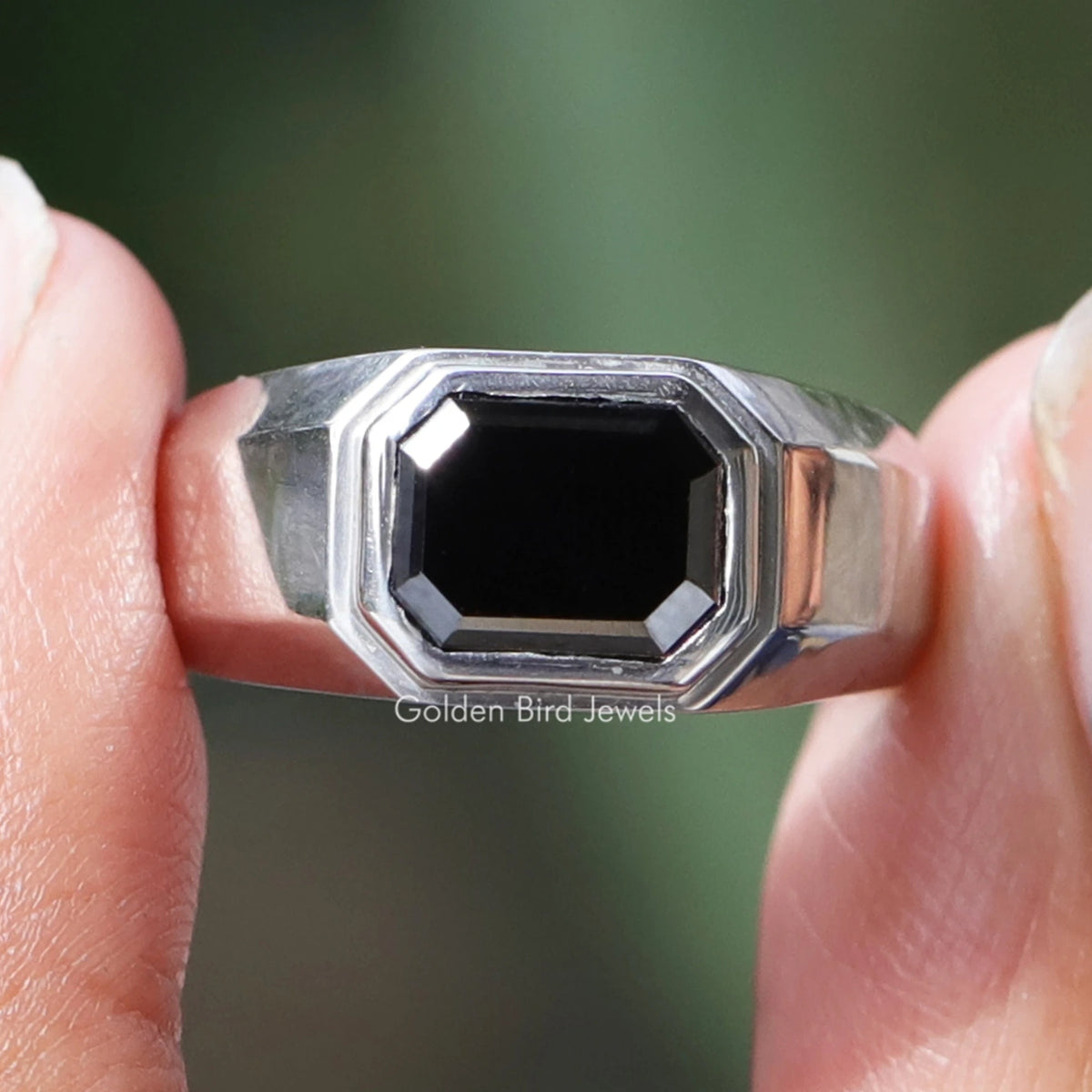 Men's emerald-cut moissanite ring with octagonal stone bezel in white gold