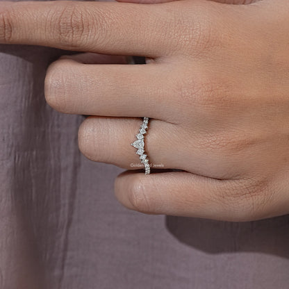 Silver chevron moissanite eternity band with pear-cut white stones, side profile