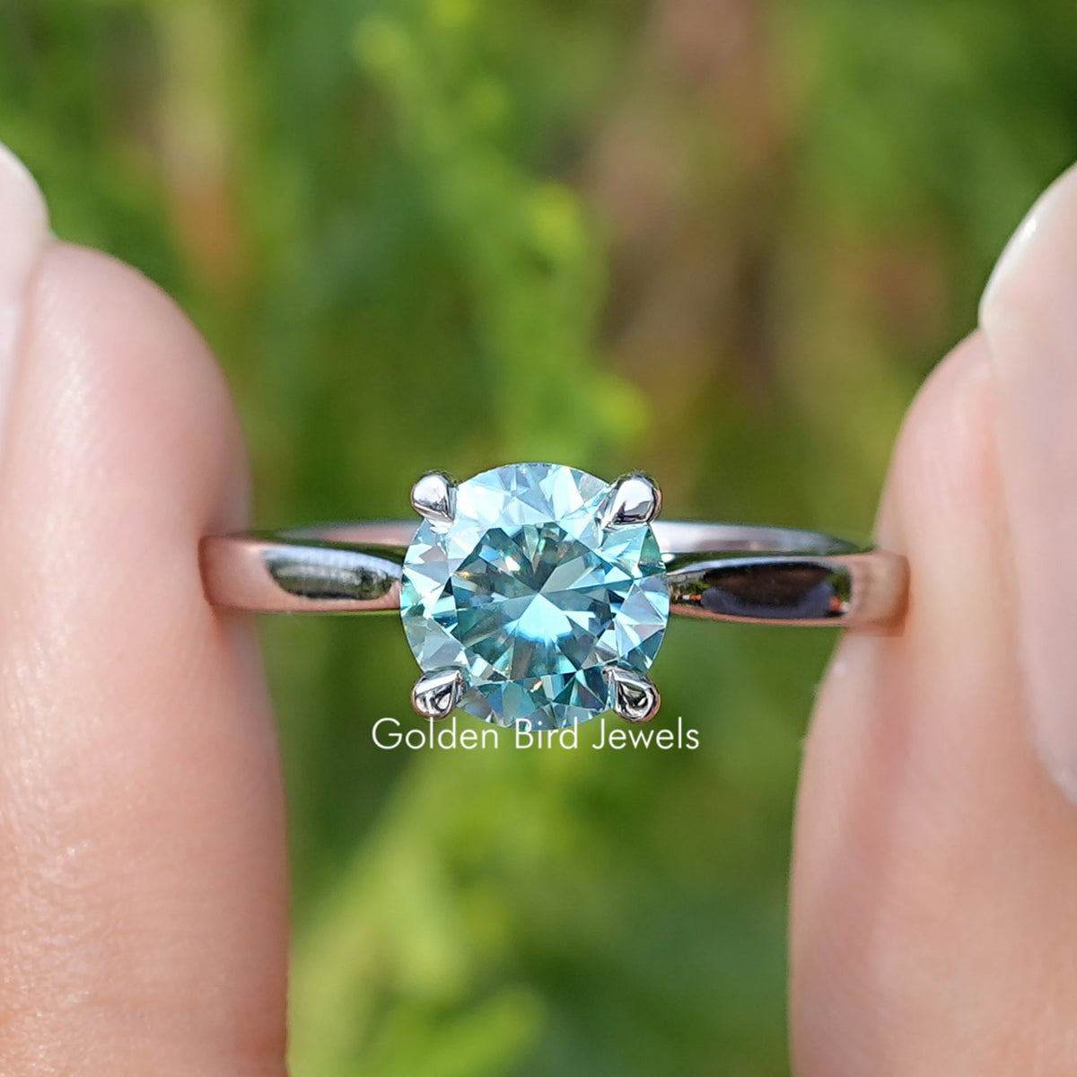 Front view of Blue Green Round Moissanite Solitaire Ring 