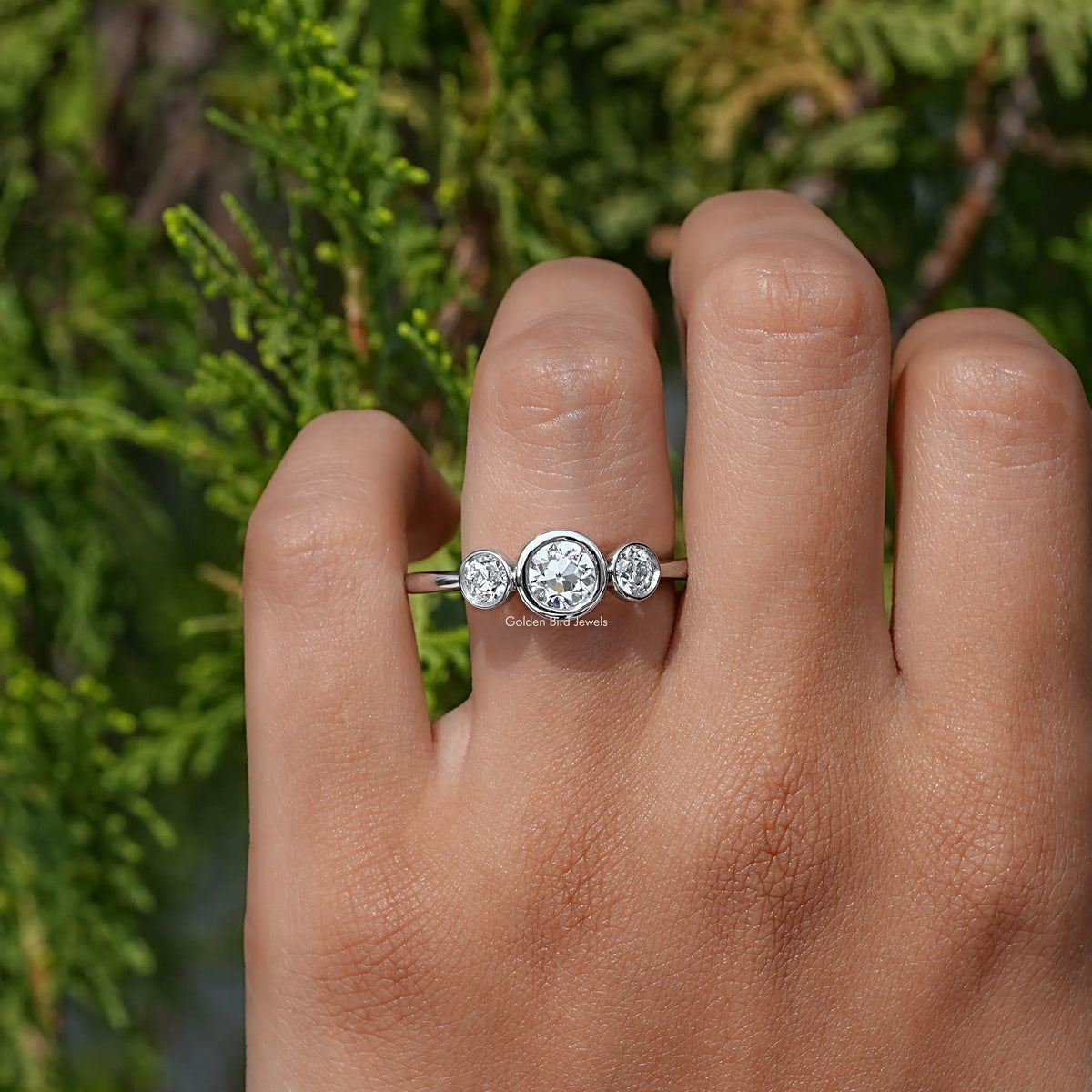 View of Old European Round Cut Diamond Three Stone Ring In White Gold