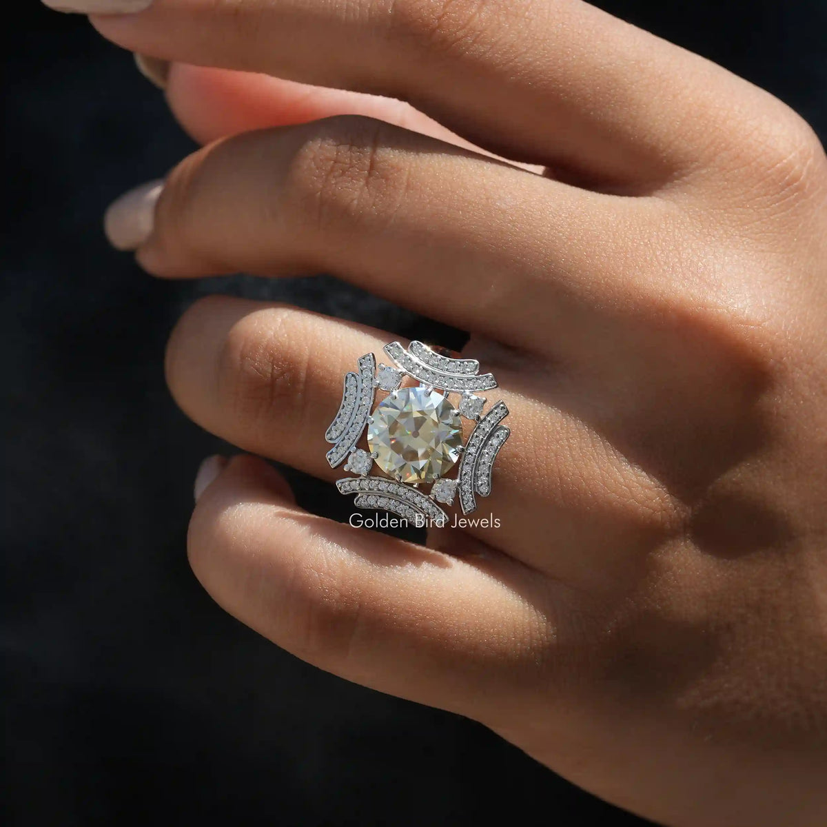 View of Round Cut Moissanite Engagement Ring In Finger
