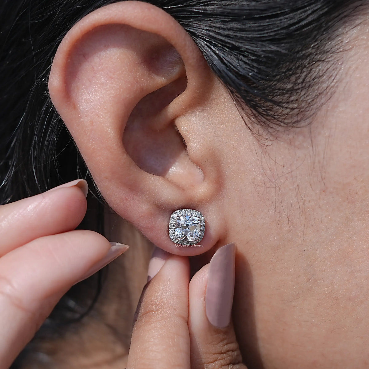 Close Up View of Old Cushion Cut Halo Stud Earrings In White Gold