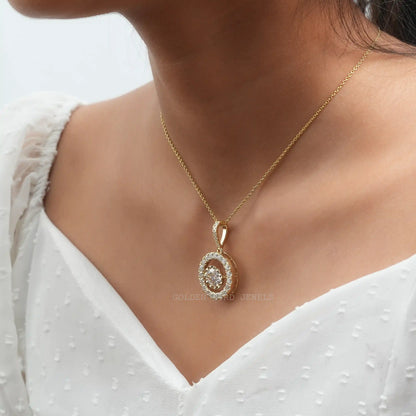 In neck front view of yellow gold round cut moissanite pendant