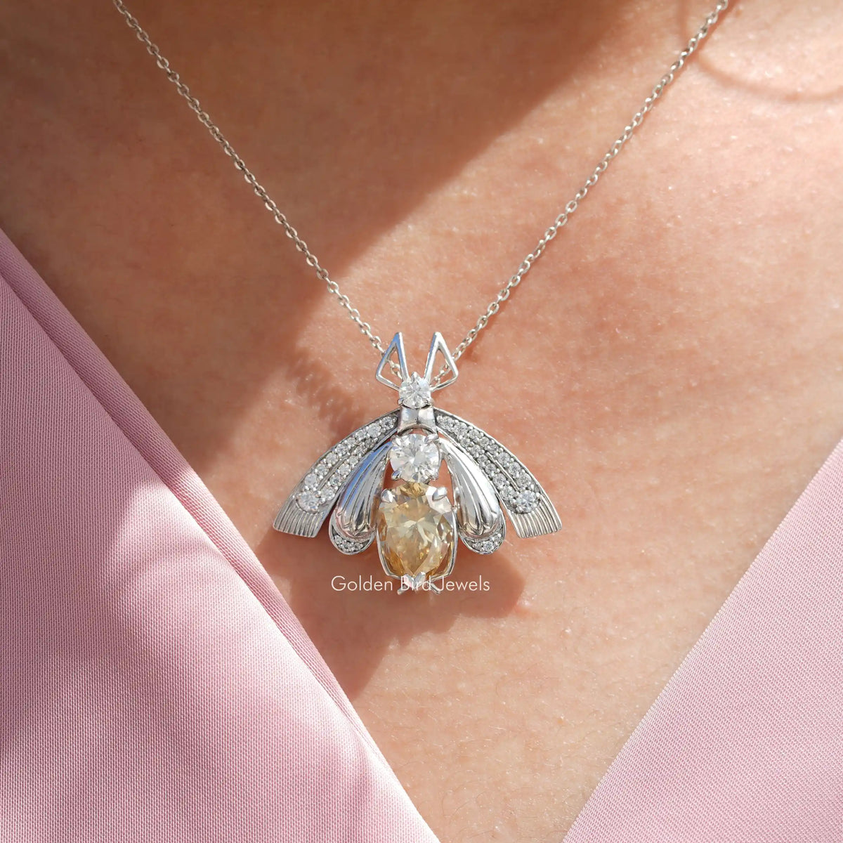 View of Pear cut moissanite solitaire pendant 

