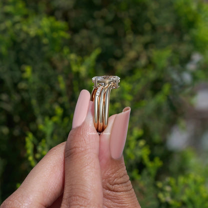 Gold-tone stacked bridal ring set with oval center lab diamond