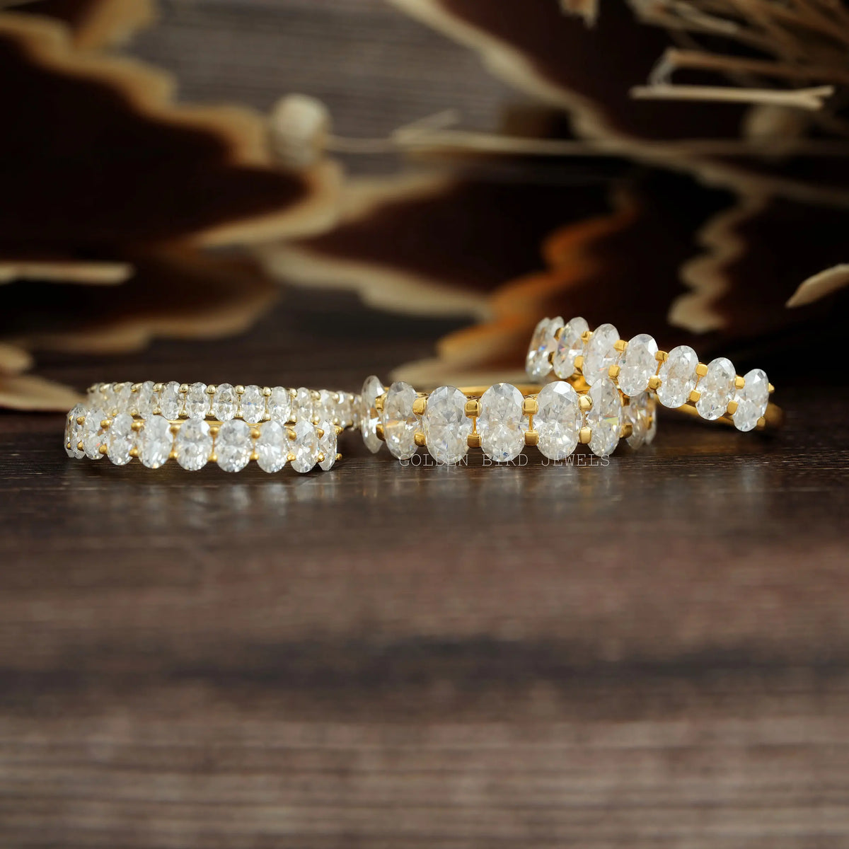Oval-cut moissanite half-eternity wedding band with oval stones, sparkling row