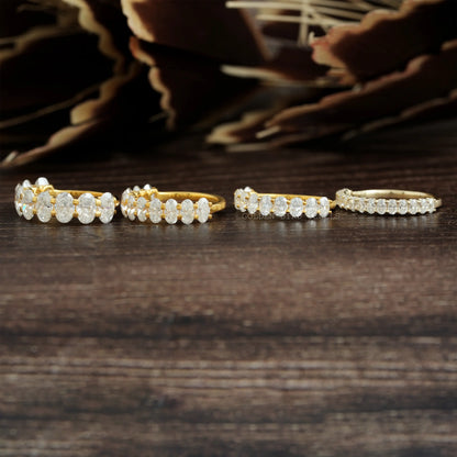 Oval-cut moissanite half-eternity wedding bands, gold- and silver-tone, oval stones